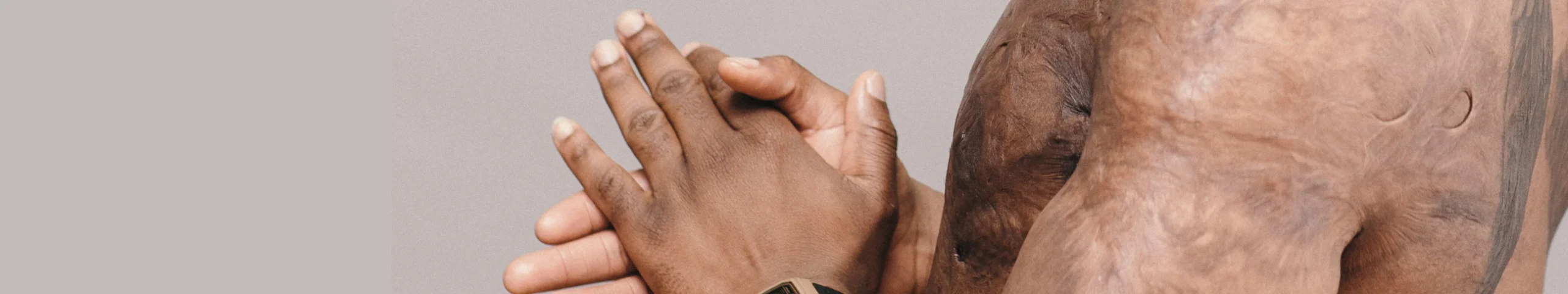 Mans chest and hands